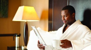 hotel- dude reading paper